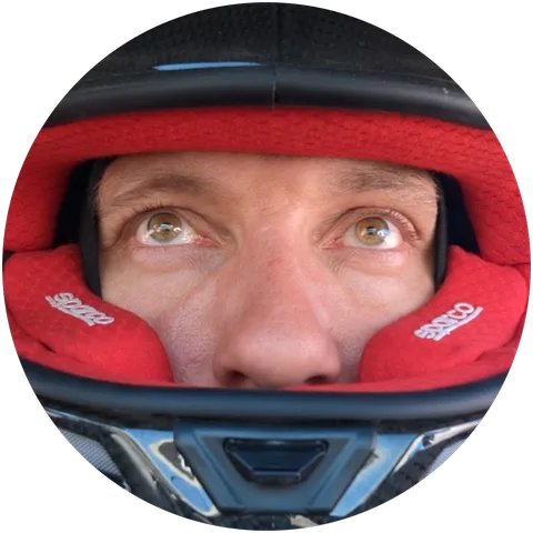 Stefan in his helmet, eyes on the camera